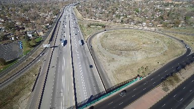 aerial view of interstate freeway exchange in large city. COLORADO