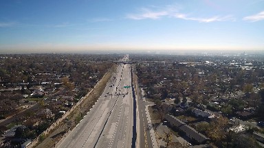 view from above of vehicles racing up and down the freeway COLORADO
