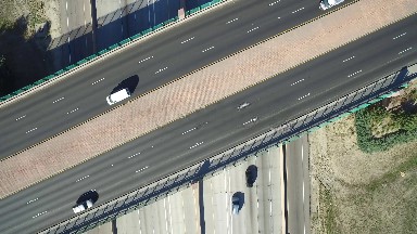 traffic going by on an overpass, seen from above COLORADO