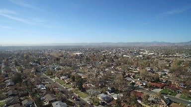 a bird's eye view of a neighborhood with houses and roofs COLORADO