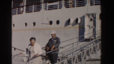 1961: People Walking Off a Boat in Nassau, Bahamas