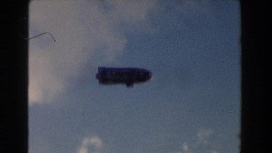 1960: A Large Goodyear Blimp Flying Through the Sky Miami Florida