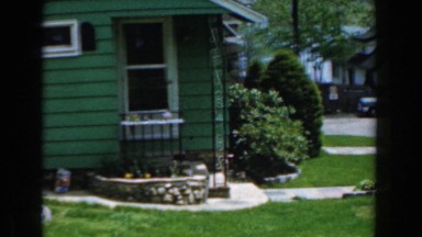1961: outside shot of quaint green colored family home and yard. NOVI MICHIGAN