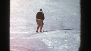 1961: three different skiers on a slope ASPEN COLORADO