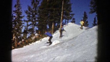 1961: three people skiing down a slope with snow ASPEN COLORADO