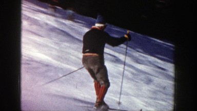 1961: a man doing tricks down a ski slope ASPEN COLORADO