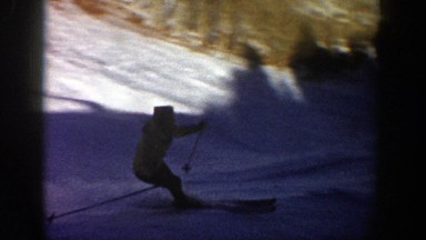 1961: a group of people skiing up a hill and then back down ASPEN COLORADO