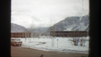 1961: beautiful mountain view and car parked on roadside ASPEN COLORADO