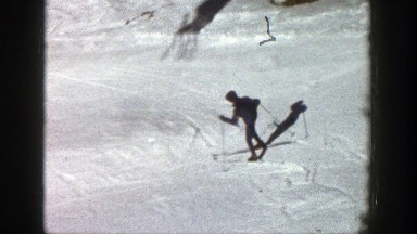 1961: skier shooshing down a bunny slope ASPEN COLORADO
