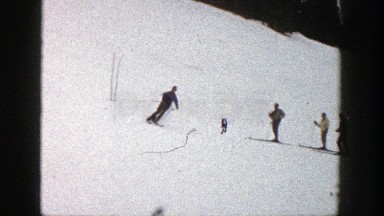 1961: skiers watching one skier ski up and down small slopes ASPEN COLORADO