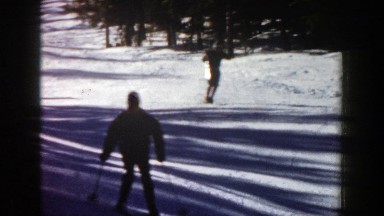 1961: People Skiing Down the Side of a Hill During Winter Aspen Colorado