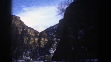 1961: passing by a cliff in a car ASPEN COLORADO