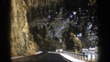 1961: scenic view from moving car along road approaching curve ASPEN COLORADO