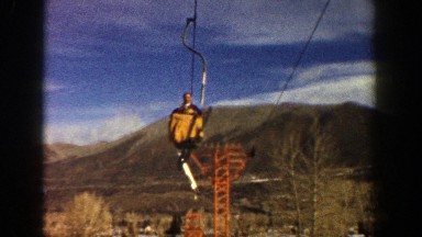 1961: man on ski lift ASPEN COLORADO