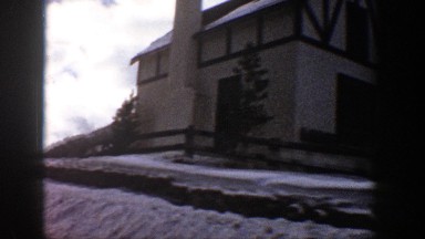 1961: person looking at house while driving by ASPEN COLORADO