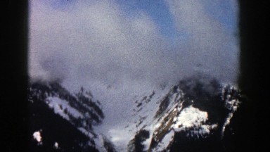 1961: clouds rapidly moving through a snow-covered valley ASPEN COLORADO