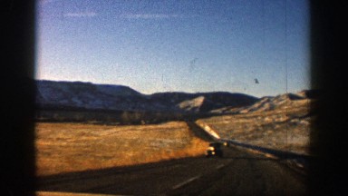 1961: vintage road driving through meadow ASPEN COLORADO