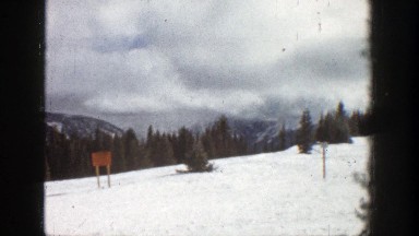 1961: Mountain Covered in Snow with Gray Skies Overhead. Aspen Colorado