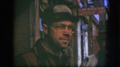 1958: person looking around and smiling, view of old townspeople KANSAS