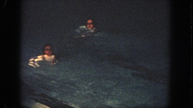 1951: three people seeming in ravel, seeming dash in the water GEORGIA