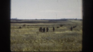 1958: group of people standing out in a large open field KANSAS