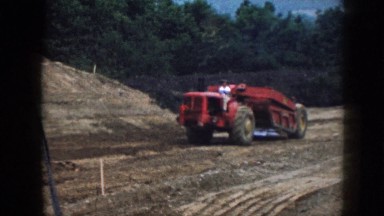 1958: man riding large machines over fields NEBRASKA