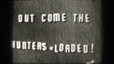 1958: white letters reading out come the hunters loaded! KANSAS