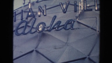 1961: Hotel Complex with Terraces Stands Behind Palm Trees and Resort Area