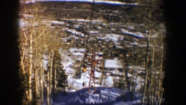 1961: Slowly Riding a Ski Lift Up a Snow-Covered Mountain in Aspen, Colorado