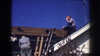 1958: Men Working on a Roof During a Hot Day in Nebraska