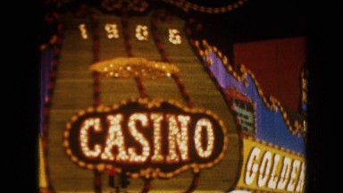 1962: a street of casinos at night ARIZONA