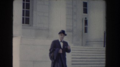 1960: man in suit poses in front of building WASHINGTON DC