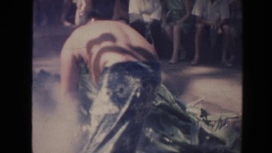 1961: half naked men attending some rituals with strange customs HAWAII