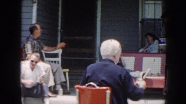 1958: People Gathered Outside a House Drinking Beer in Nebraska