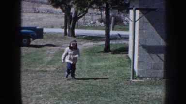 1958: Baby Runs Through Garden Enjoys Childhood in Nebraska