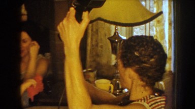 1959: members of a family in the drawing room engaged in different activities