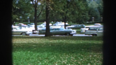 1959: traffic nearby the park,group of cars struggled NEBRASKA