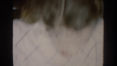 1959: a woman engaged in some facial work in the kitchen and runs NEBRASKA