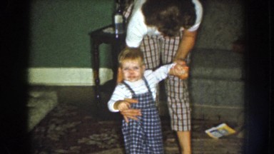 1959: woman attempting to dance with her toddler NEBRASKA