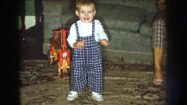 1959: little toddler clapping and playing. NEBRASKA