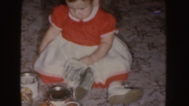 1955: child having money in the hand and don't know what to do. NEBRASKA
