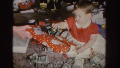 1955: little kid not interested in christmas present NEBRASKA