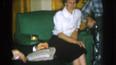 1957: a family gathered into a living room NEBRASKA