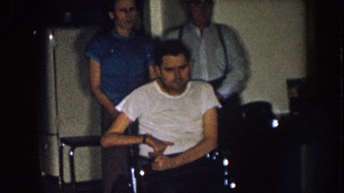 1957: man in wheelchair with his parents NEBRASKA