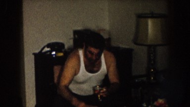 1957: smoking and drinking and relaxing on the couch NEBRASKA
