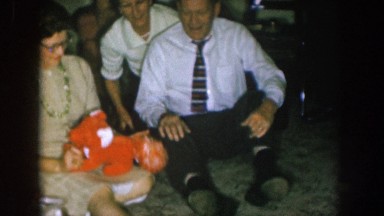 1957: a woman holding a fox plush NEBRASKA
