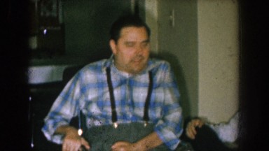 1957: two men sitting in a chair and talking to each other NEBRASKA