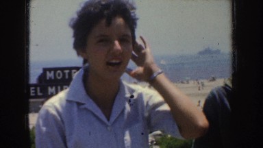 1952: One Woman Talks to Two Women on California Beach