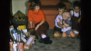 1957: four siblings posing for a family photo. NEBRASKA