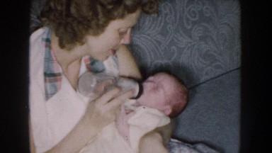 1959: mother bottle feeds infant milk NEBRASKA